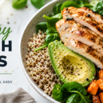 Healthy lunch bowl with grilled chicken, avocado, quinoa, and fresh vegetables